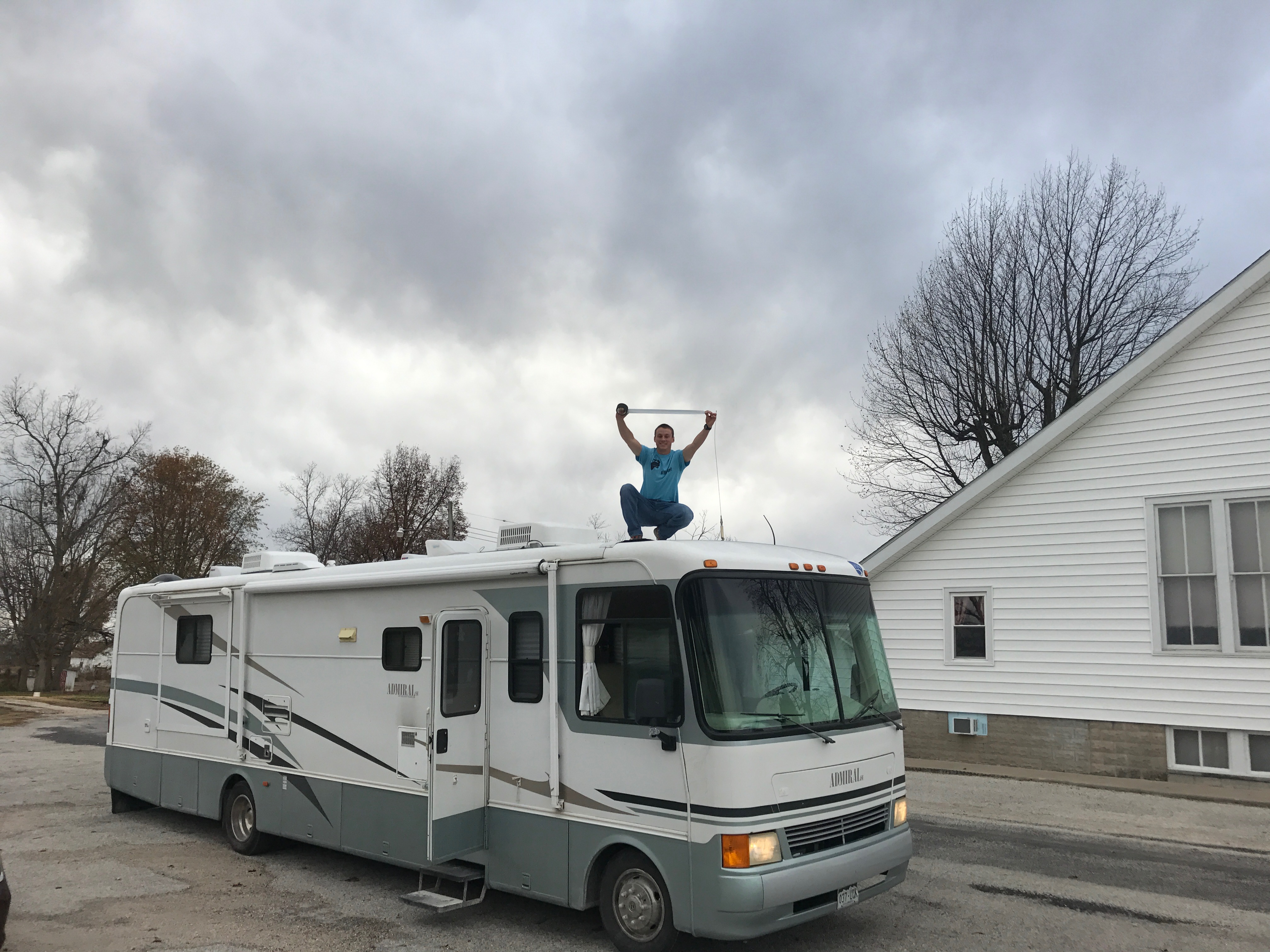 once-again-uncle-sam-doing-the-oddest-fix-it-jobs-this-time-gafer-taping-the-top-of-the-rv-before-a-long-drive_31291827822_o